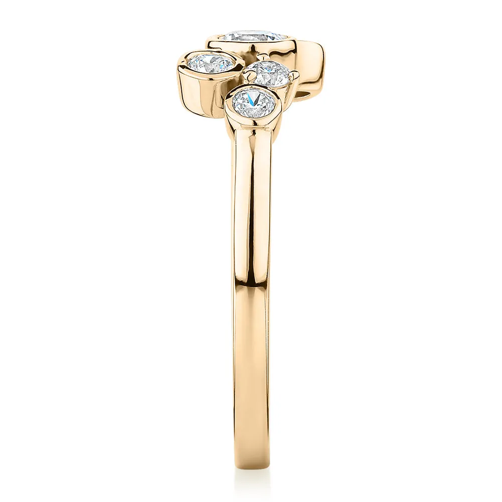 Dress ring with 0.39 carats* of diamond simulants in 10 carat yellow gold
